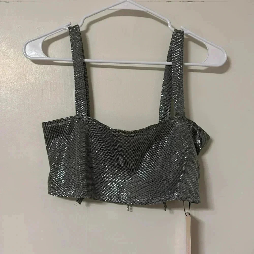 Metallic going out top